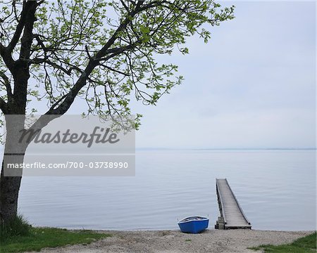 Boat and Dock on Lake Chiemsee, Bavaria, Germany