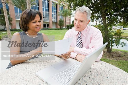 Business People with Laptop Outdoors