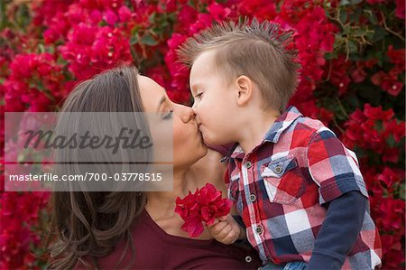 Mother and Son Kissing