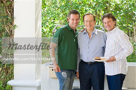 Portrait of Father and Sons at Barbeque