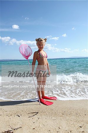 Girl with Net on Beach