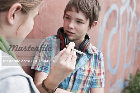 young people smoking cigarettes