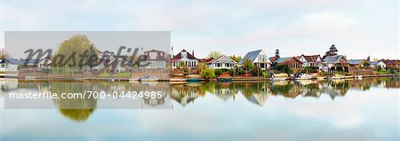 Cottages and Boats on the River Thames, Hampton Court, London, England, United Kingdom