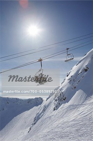 Skiers on Ski Lift, Whistler Mountain, Whistler, British Columbia, Canada