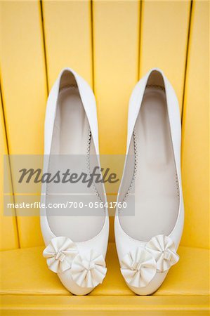 Bride's Shoes on Yellow Chair