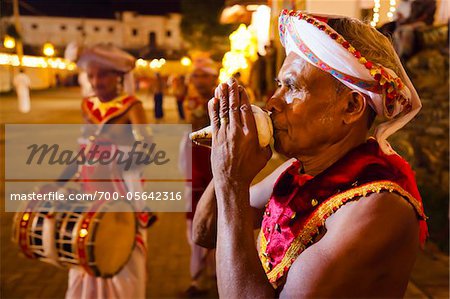 Man Playing Conch Shell Trumpet, Esala Perehera Festival, Kandy, Sri Lanka