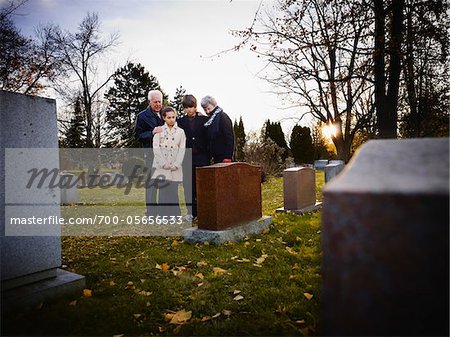 Family Grieving in Cemetery