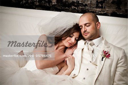 Bride and Groom Cuddling