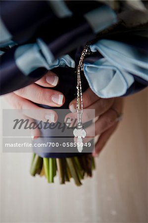 Bride Holding Bouquet and Rosary