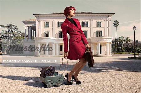 Woman with Briefcase and Toy Carriage Woman with Briefcase and Toy Carriage