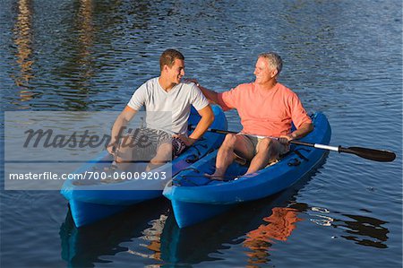 Father and Son in Kayaks