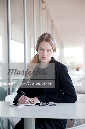 Businesswoman Sitting at Table Outdoors