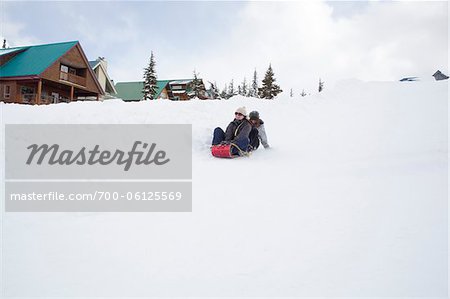 Teenagers Tobogganing, Mount Washington Ski Resort, Vancouver Island, British Columbia, Canada