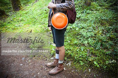 Male Hiker with Orange Canteen Male Hiker with Orange Canteen