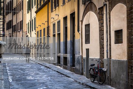 Man Walking on Narrow Street, Florence, Tuscany, Italy