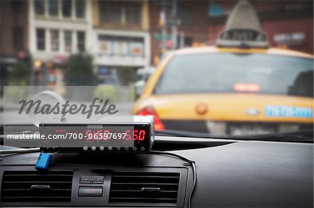 Interior of Taxi Cab with Meter Running Interior of Taxi Cab with Meter Running