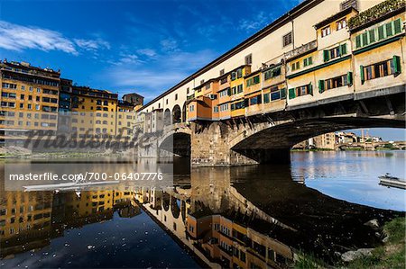 Rower on Arno River, Ponte Vecchio, Florence, Tuscany, Italy Rower on Arno River, Ponte Vecchio, Florence, Tuscany, Italy