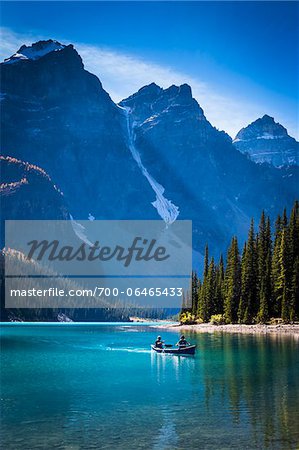 Canoeists on Moraine Lake, Banff National Park, Alberta, Canada Canoeists on Moraine Lake, Banff National Park, Alberta, Canada