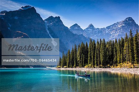 Canoeists on Moraine Lake, Banff National Park, Alberta, Canada Canoeists on Moraine Lake, Banff National Park, Alberta, Canada