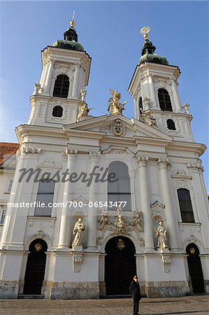 Man Standing in front of Church of Mariahilf (Mariahilferkirche), Graz, Styria, Austria