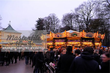 Carousel at Christmas Market at the Chinese Tower (Christkindlmarkt am Chinesischen Turm) in the English Garden, Munich, Bavaria, Germany