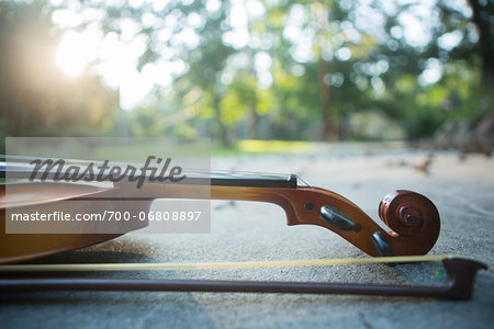 Violin outside on concrete