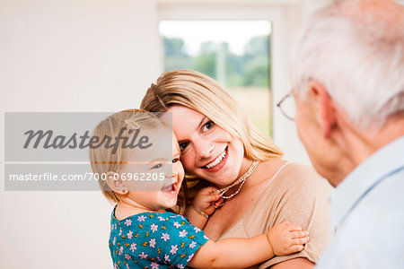 Young Woman and Baby Girl with Senior Man, Mannheim, Baden-Wurttemberg, Germany