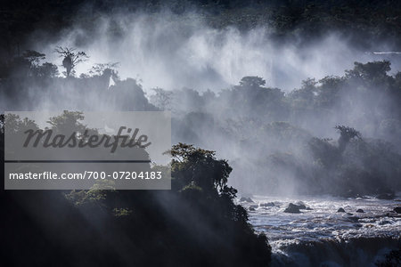Scenic view of Iguacu Falls with streaming rays of light, Iguacu National Park, Parana, Brazil