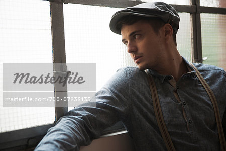 Portrait of Young Man by Window, Mannheim, Baden-Wurttemberg, Germany