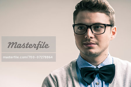 Close Up Portrait Of Student Young Man Wearing Bow Tie And