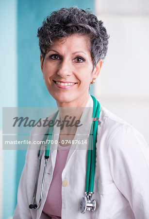 Portrait of Doctor with Stethoscope in Doctor's Office