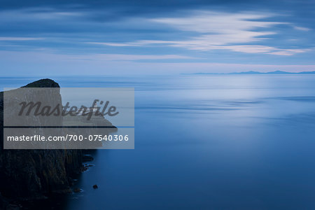 Neist Point Light House and the Inner Hebrides at dusk, Isle of Skye, Scotland