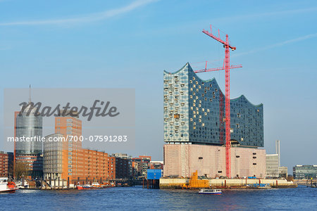 Elbe Philharmonic Hall with Construction Cranes on Elbe River, HafenCity, Hamburg, Germany