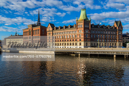 Centralbron Bridge along the Norrstrom River with the Gamla Riksarkivet (Old National Archives building) and Norstedt Building, Riddarholmen, Stockholm, Sweden