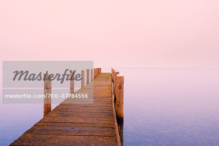 Wooden Jetty on lake, Schweriner Innersee, Schwerin, Western Pomerania, Mecklenburg-Vorpommern, Germany