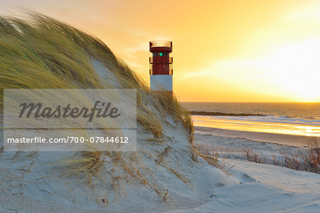 Beach with Lighthouse at Sunrise, Helgoland, North Sea, Schleswig-Holstein, Germany