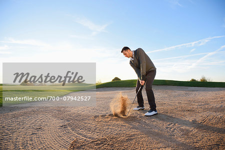 Man Playing Golf on Golf Course in Autumn, Bavaria, Germany