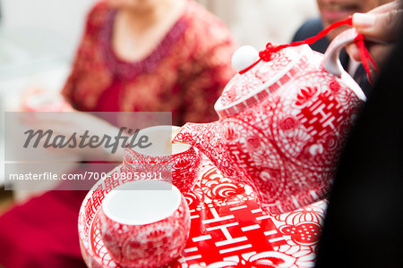 Pouring Tea for Chinese Tea Ceremony for Wedding