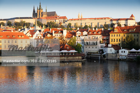 Harbor scene with St Vitus Cathedral in background at sunset, Prague, Czech Republic Harbor scene with St Vitus Cathedral in background at sunset, Prague, Czech Republic