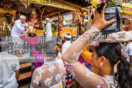 People carrying religious offerings, Temple Festival, Petulu, near Ubud, Bali, Indonesia