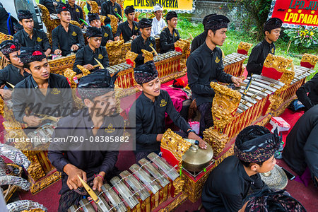 Gamelan slenthem players, at a Balinese ceremony in Junjungan, near Ubud, Bali, Indonesia