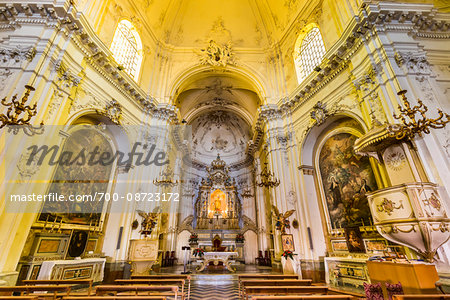 Elaborate, glowing interior of the Church of Carmine (Chiesa del Carmine) in Noto in the Province of Syracuse in Sicily, Italy