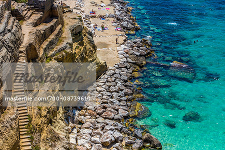 Stone staircase along the coastal cliffs at a resort in Santa Cesarea Terme in Puglia, Italy