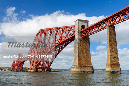 The famous Forth Bridge over Firth of Forth at low tide at South Queensferry in Edinburgh, Scotland, United Kingdom The famous Forth Bridge over Firth of Forth at low tide at South Queensferry in Edinburgh, Scotland, United Kingdom