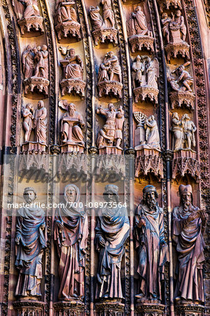 Detail of the high-relief sculptures used to decorate the exterior of the Strasbourg Cathedral (Cathedral Notre Dame of Strasbourg) in Strasbourg, France
