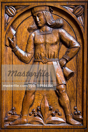 Close-up of an historical wooden carving of government official on a door at the Basel Town Hall (Rathaus), Basel, Switzerland