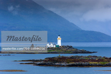 Ornsay Lighthouse with low hanging clouds on the Isle of Skye in Scotland, United Kingdom