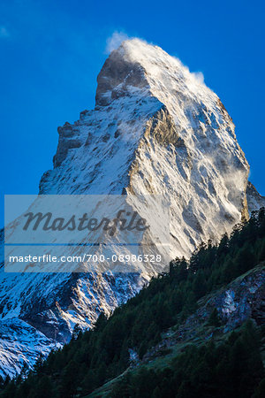 Close-up of the iconic Matterhorn mountain with blowing snow at Zermatt in Switzerland