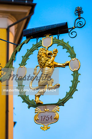 Close-up of sign of a golden lion in the Old Town of Innsbruck, Austria