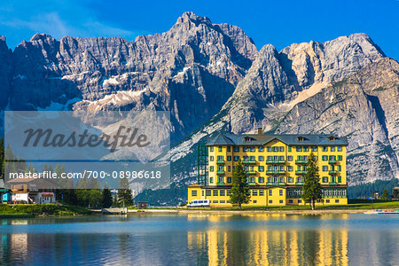 Grand Hotel Misurina and mountains reflected in Lake Misurina in the Dolomites near Cortina d'Ampezzo, Italy